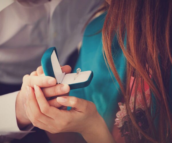 marriage proposal with engagement ring