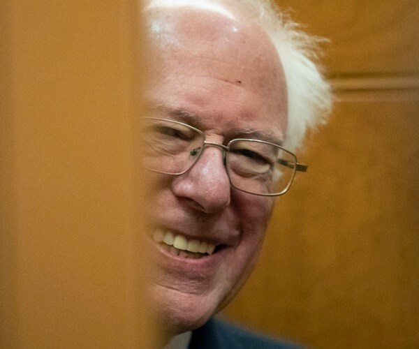 bernie sanders in an elevator with the door closing