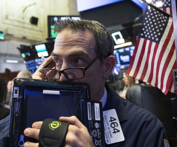 trader gregory rowe works at the new york stock exchange in new york.