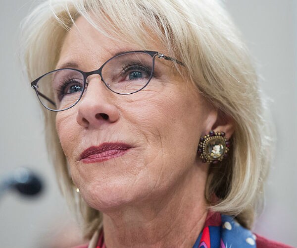 Dems Hammer DeVos on School Funding, Racial Bias and Guns
