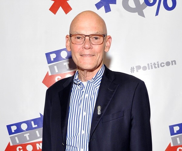 james carville poses for a picture at a political conference