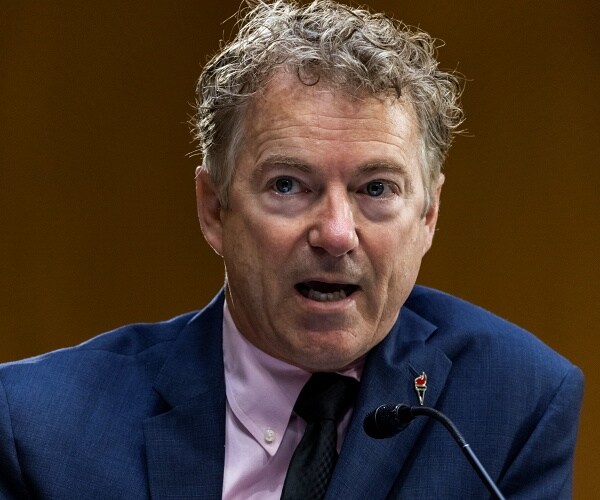rand paul sits in hearing