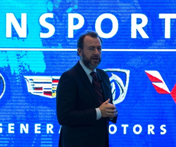 dan ammann speaks onstage