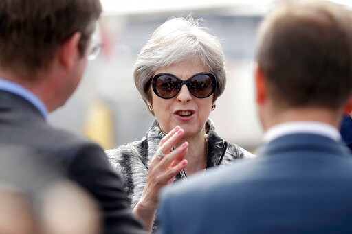 The Latest: UK's May Halts Revolt over Brexit Trade Bill