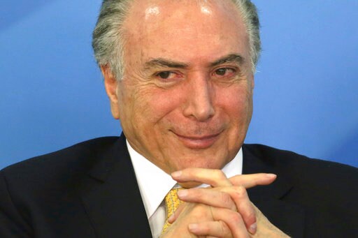 The Latest: Brazil's Temer Charged with Obstructing Justice