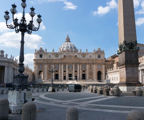 vatican city, st. peter's square with obelisk and st. peter's basilica