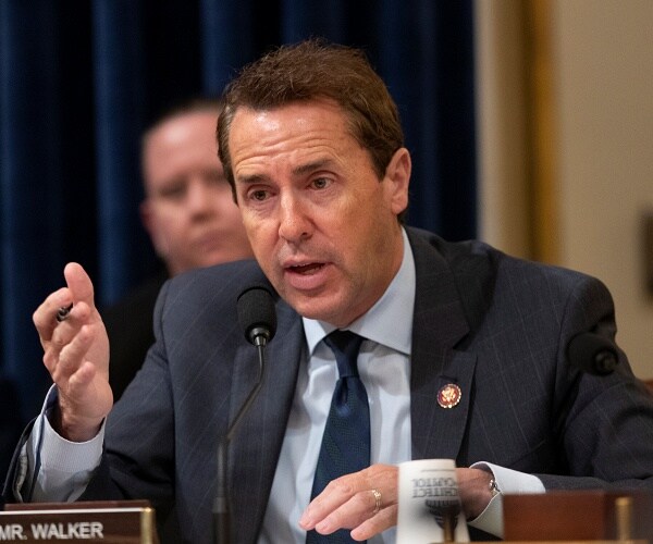 mark walker speaks at hearing