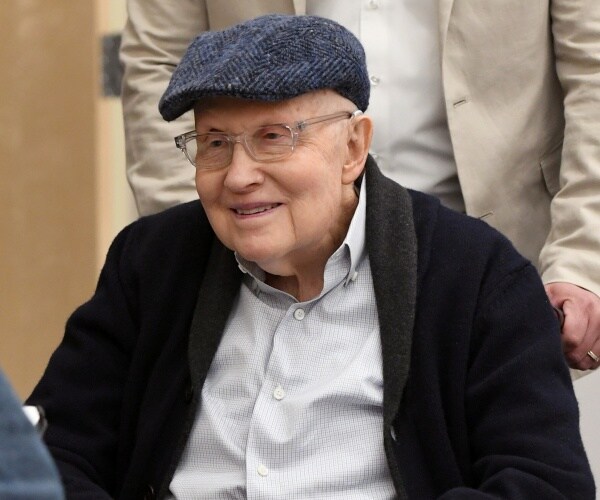 Harry Reid sitting in a wheelchair.