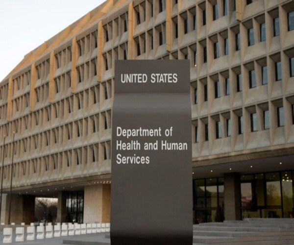 sign outside headquarters of U.S. Department of Health and Human Services