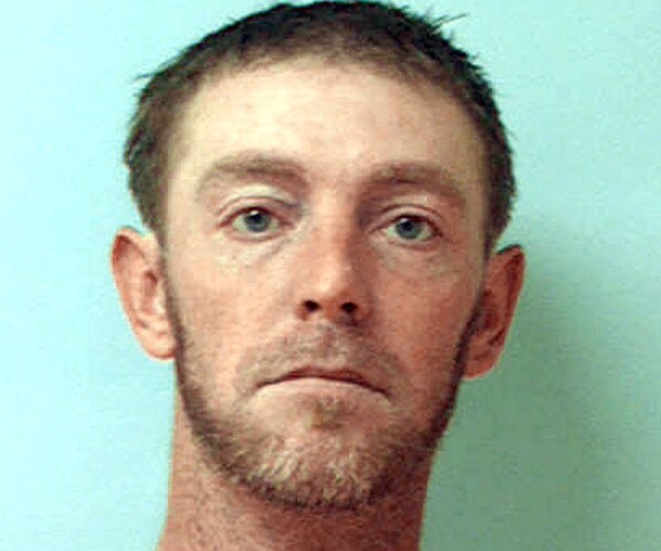 Escaped Inmate Suspected in Killing is Captured After Chase