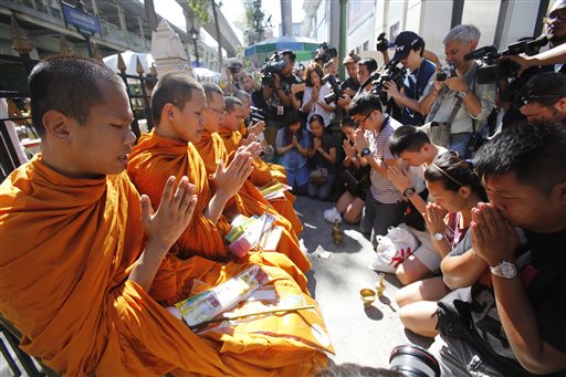 The Latest on Bangkok: Relatives Claim Bodies of Victims