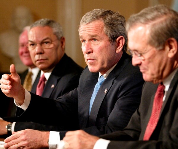 president george w. bush with colin powell and donald rumsfeld a