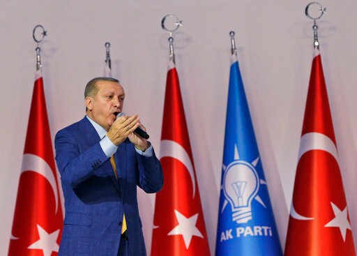 The Latest: Turkey's Erdogan Re-elected as Party Leader