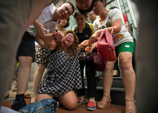 2 Dozen Chinese Relatives of MH370 Passengers Stage Protest