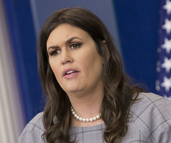 sarah sanders at podium