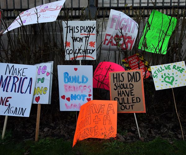 Protesters Litter Trump International, Trump Tower With Signs