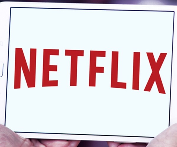netflix corporate logo symbol on tablet screen