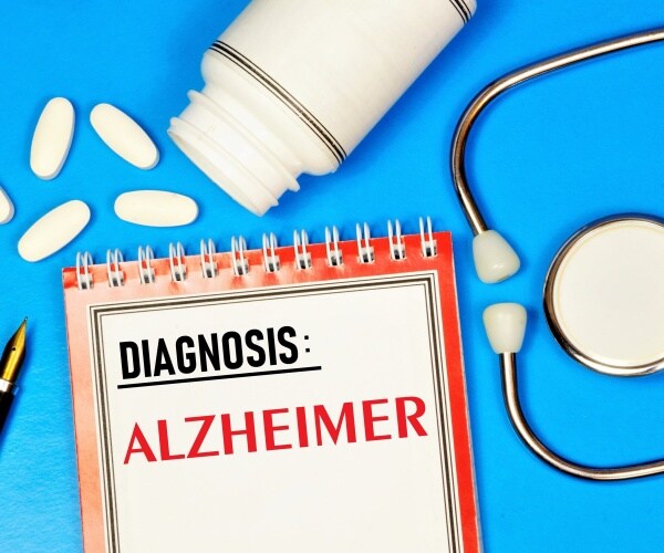 Diagnosis of Alzheimer's on pad, meds, stethoscope