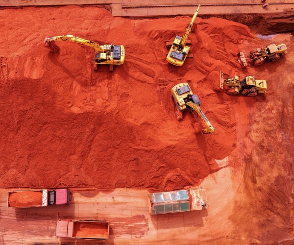 heavy machinery and iron ore