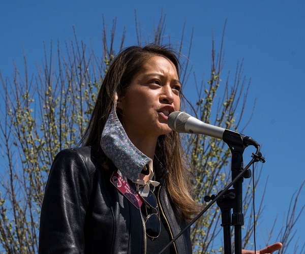 bee nguyen speaks to demonstrators