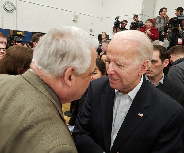 former vice president joe biden talks to newsmax's john gizzi in iowa