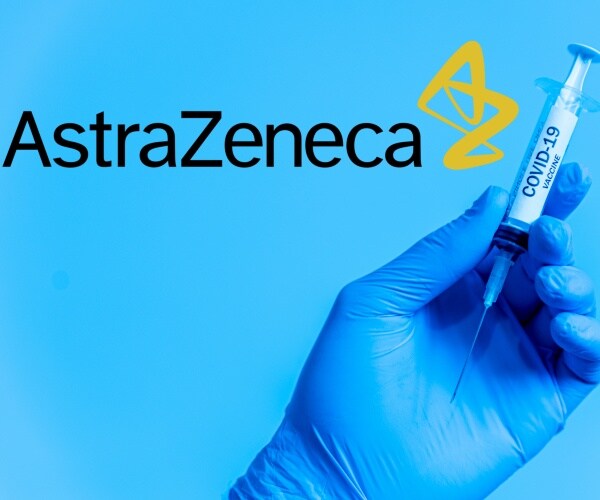 AstraZeneca logo and syringe with COVID vaccine