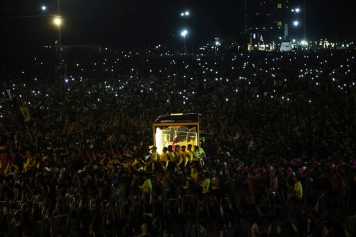 Filipino Catholics Pray for Good Health and Peace in Huge Procession Venerating Jesus Statue