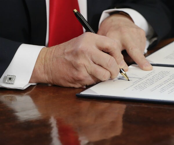 Judge Gives 2-Week Extension to Trump Lawyers in Travel Ban Suit