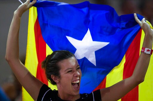 The Latest: Madrid Takes over Catalonia Bills to Quell Vote