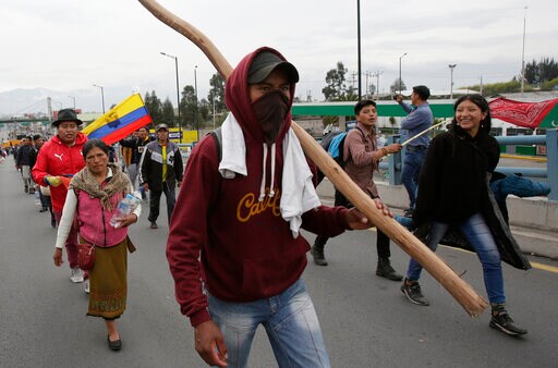 Protesters Move into Ecuador's Capital; President Moves out