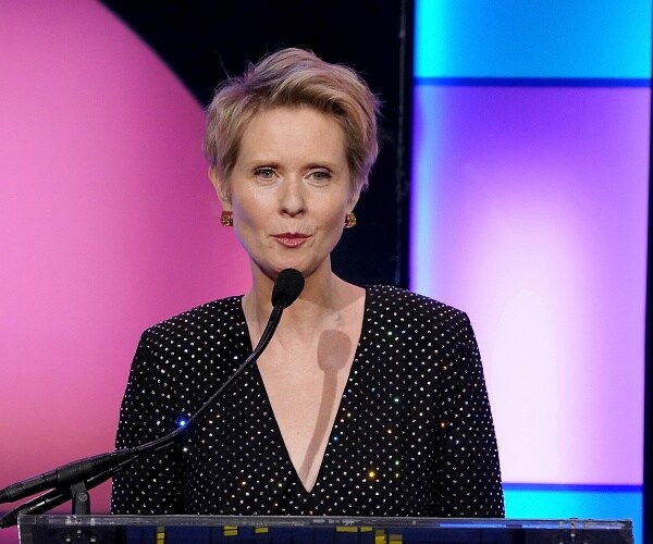 cynthia nixon speaks into mic