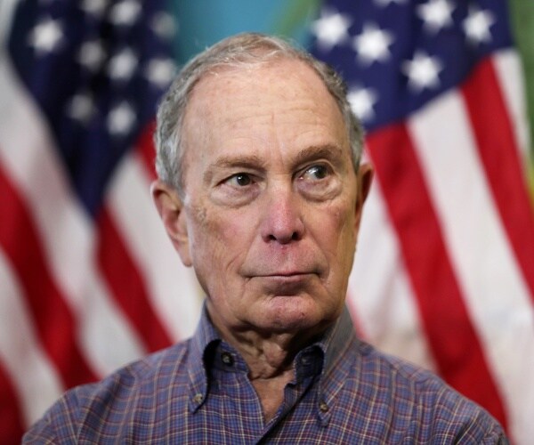 bloomberg in a blue checkered shirt