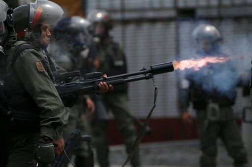 The Latest: Venezuela Troops Launch Tear Gas at Protesters