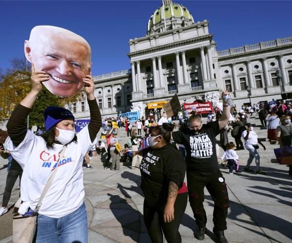 Biden Win Call Brings Protest, Tense Moments and Some Celebration