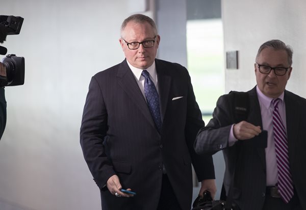 former donald trump campaign official michael caputo, left, joined by his attorney dennis c. vacco
