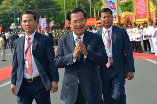 The Latest: Cambodia's Opposition Leader Lands in Malaysia