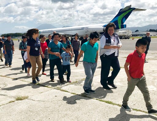Exhausted and Subdued, Reunited Families Return to Guatemala