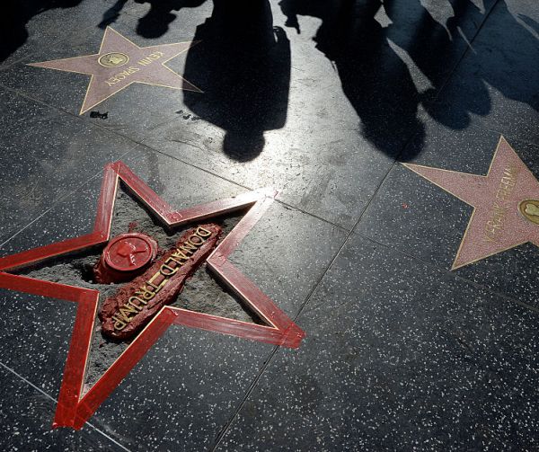 Trump Supporter Cleans Trump's Star, Gets Praise and Criticism