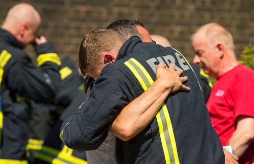 Adele Visits London Firefighters after Tower Block Blaze