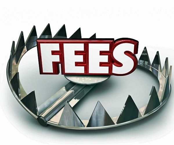 Fees word in red 3d letters on a steel bear trap with pointy teeth 