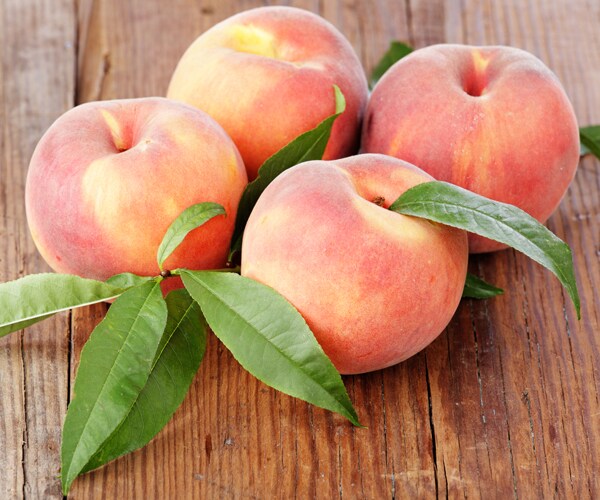 peaches on a wooden table