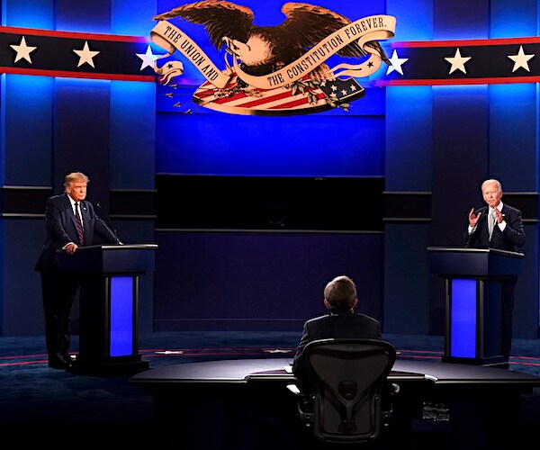 president donald trump and joe biden on the stage at the first presidential debate in cleveland