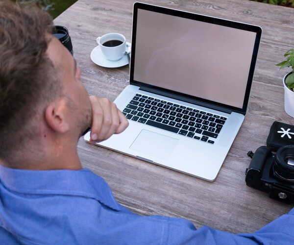 a man working at his laptop
