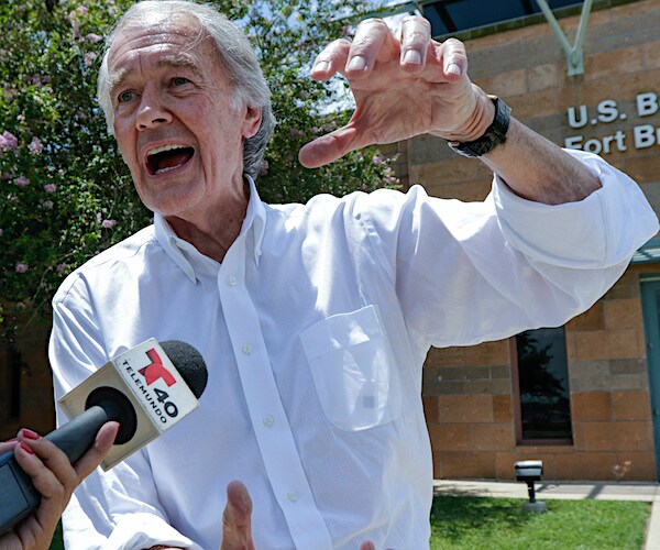ed markey exults during a media interview