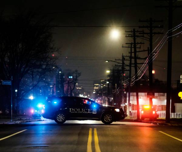 a police vehicle blocking a street
