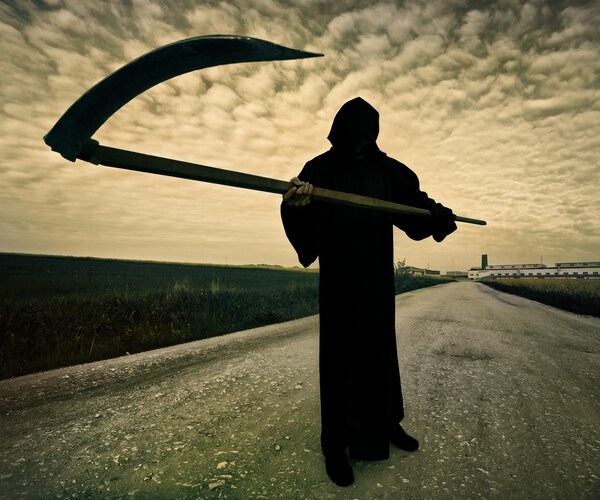 grim reaper on the road 

