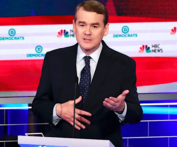 michael bennet speaks during one of the democratic presidential primary debates