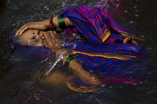 India's River Waters Cleanse Spirits at Hindu Festival