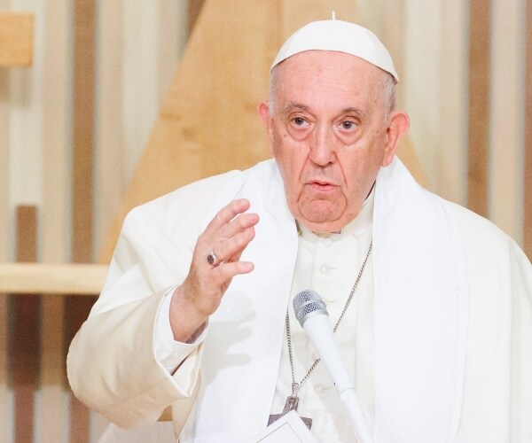 pope francis gestures while speaking