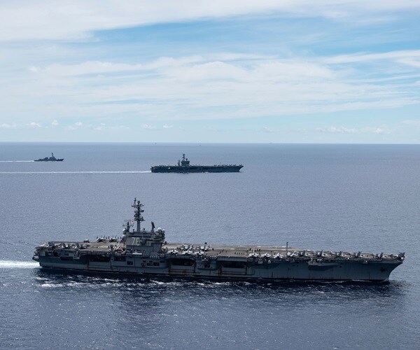 US, China Trade Jibes as Military Tensions Worsen